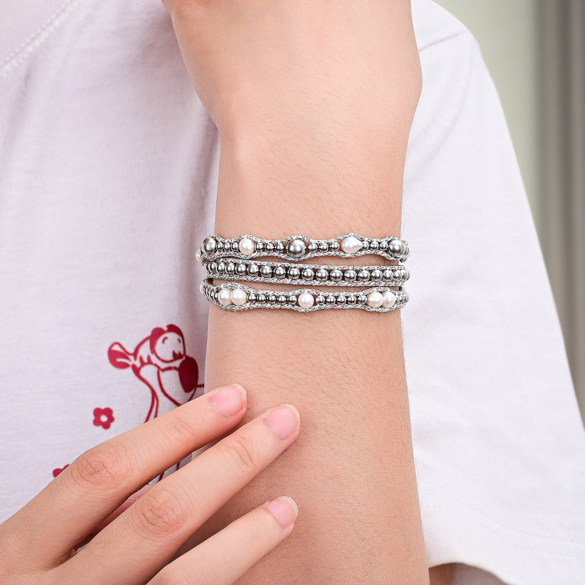 Pulsera envolvente de protección con perla brillante