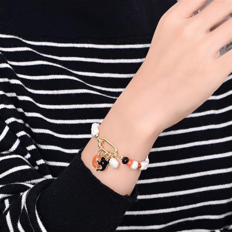 Pulsera de perlas con brillo navideño