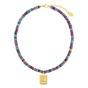 Collar de burbujas con inicial de gema vibrante