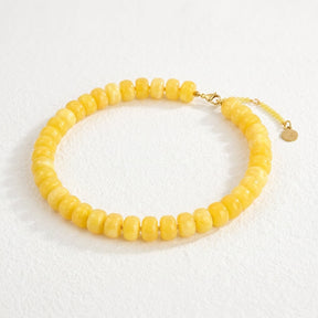 Collar llamativo con brillo color miel