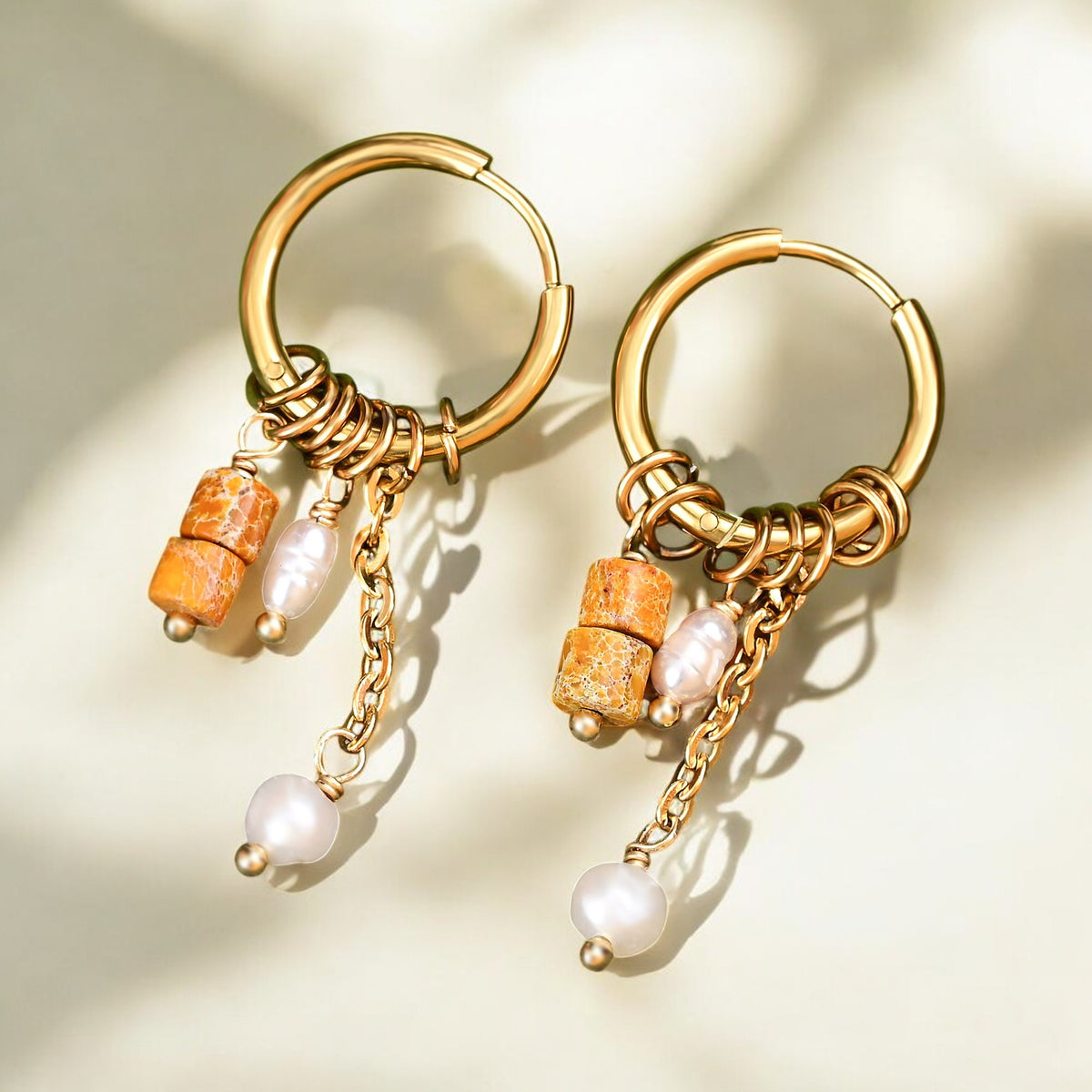 Pendientes de aro con gota de flor de óxido dorado