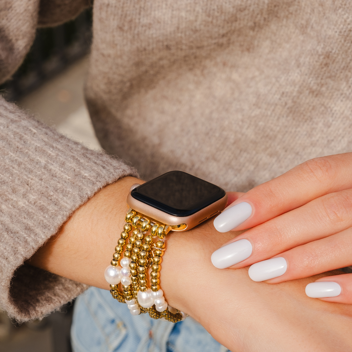 Correa elástica de oro y perla para Apple Watch