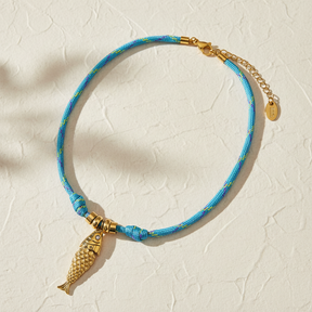 Collar con amuleto de pez Viaje Oceánico